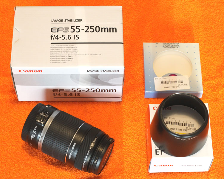   A vendre Objectif Canon EFS 55-250 mm f / 4 - 5.6 IS avec pare-soleil et filtre 1010300712081189447023486